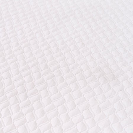 Colchón Compactado y enrollado: Adaptabilidad y Soporte en un Diseño Comprimido.